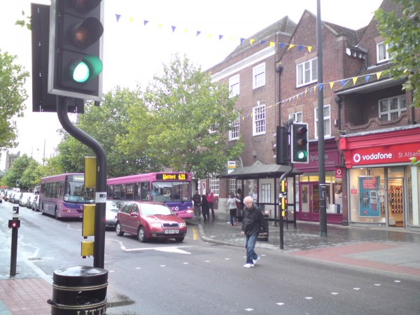 A man openly jaywalking in St Albans city centre